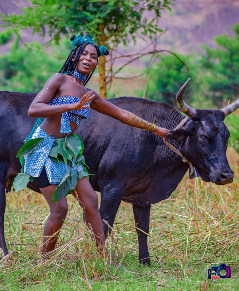 Tatenda Mitchell Deda herding a cow