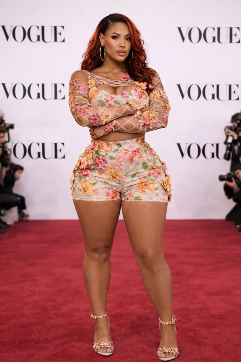 Beautiful Badgyal Nera - Woman wearing structured floral corset two-piece set on red carpet showcasing Spring 2026 fashion trends for women