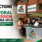 10 Functions of the Electoral Commission of Zambia (ECZ): Roles, Duties & Responsibilities Illustration of the Electoral Commission of Zambia (ECZ) headquarters, official ECZ logo, and election officials representing the 10 functions of the Electoral Commission in Zambia.