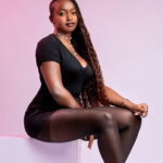 Trending video of a girl in Zambia — confident Zambian girl in black dress