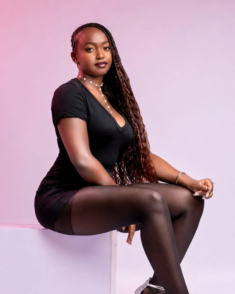 Trending video of a girl in Zambia — confident Zambian girl in black dress